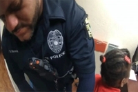 Six year old schoolgirl arrested and cuffed with cable ties