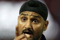 Harbhajan slams jet airways pilot for racist remarks physical assault