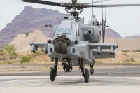 Air force gets its first apache attack helicopter at boeing plant in us