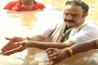 Hindupuram mla balakrishna took holi bath in godavari maha pushkaralu