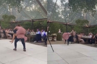 Viral video groom piggybacks bride while dancing watch what happens next