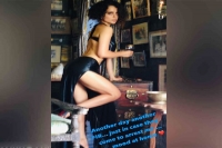 Kangana ranaut posts a bold photo in a skimpy black thigh slit skirt reacting to the fir