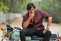 Rx 100 movie hero kartikeya offers bike for auction